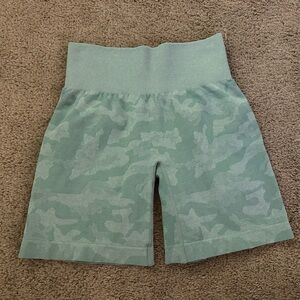 NVGTN Green Camo High-Waisted Shorts.